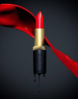 L'Oreal red lipstick with liquid splashes